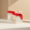 Red clothing, handmade bow accessories, colorful ribbons details Picture